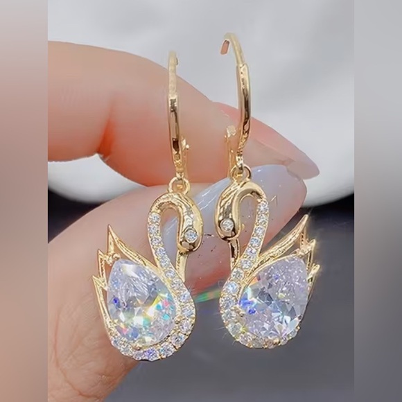 Elegant Gold Swan Earrings - Picture 2 of 4